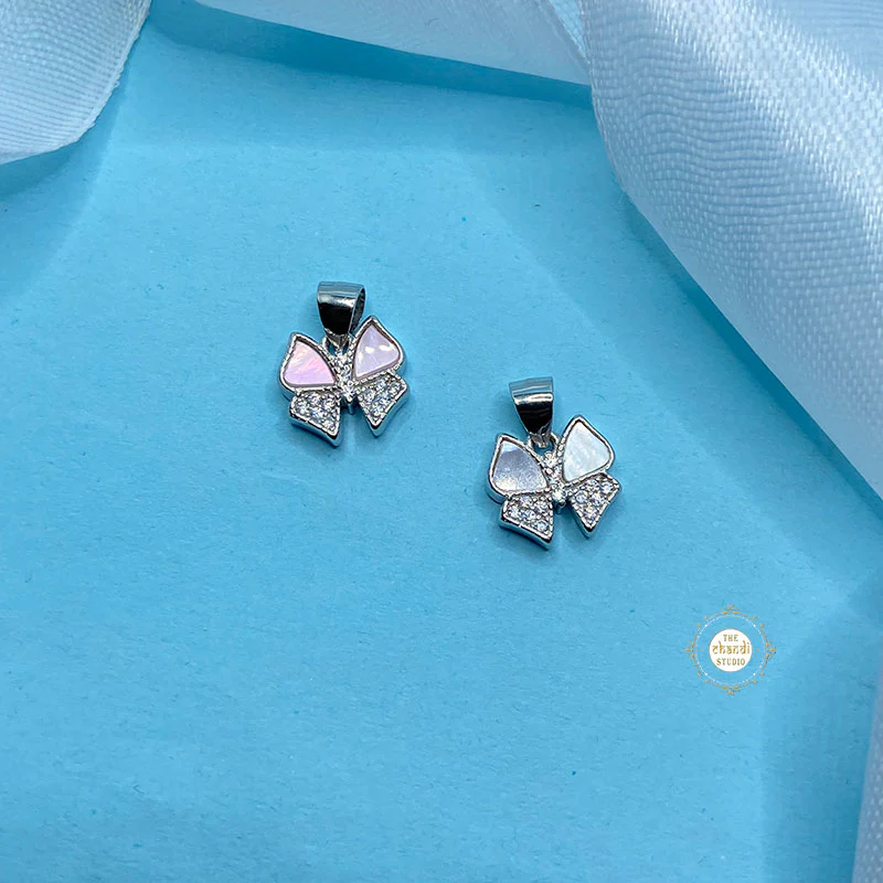 Sparkling Silver Minimal Bow Pendant - Image 2